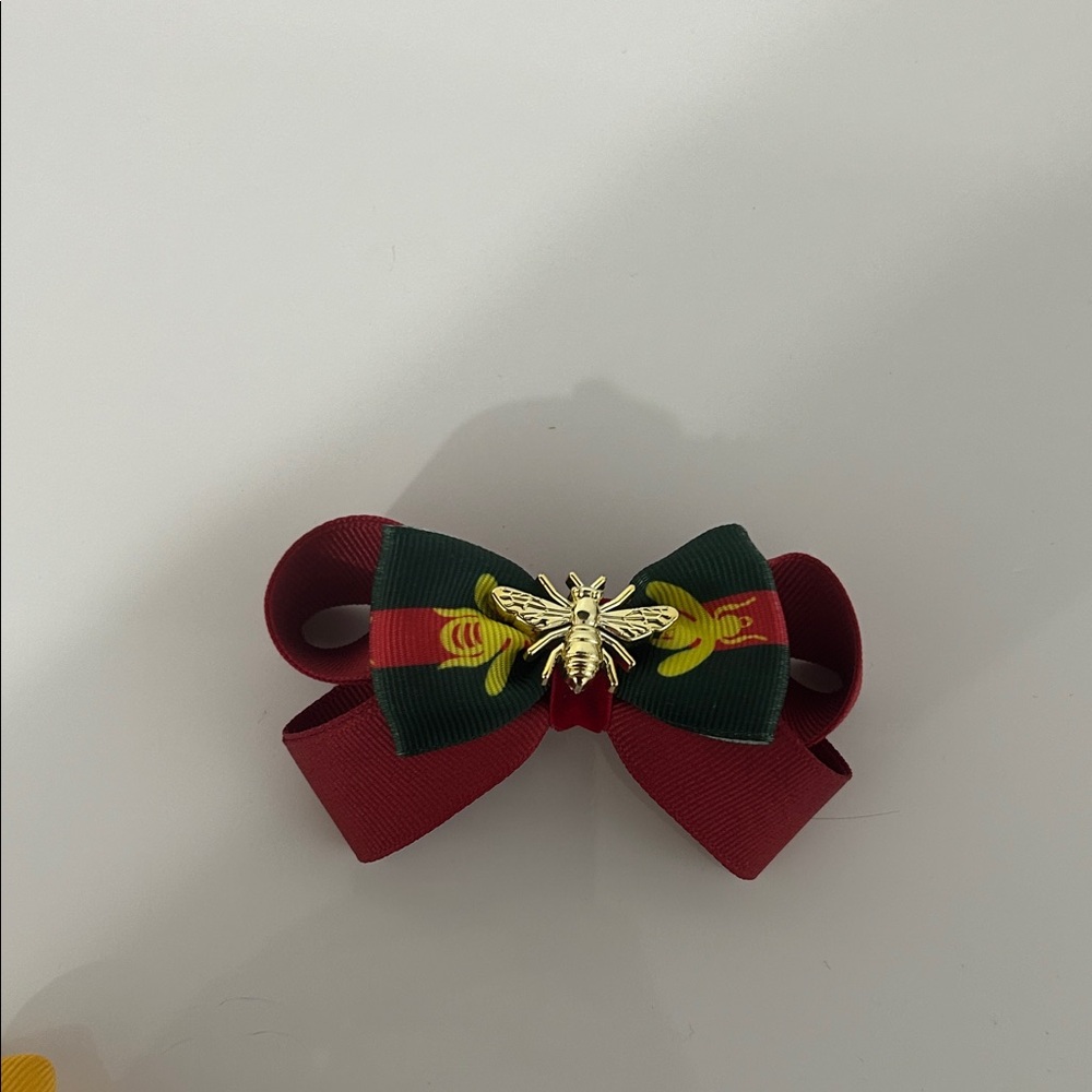 Elegant Red and Green Bow with Gold Bee Accent
